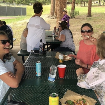 team members at picnic tables
