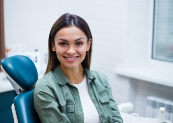 woman smiling in exam chair