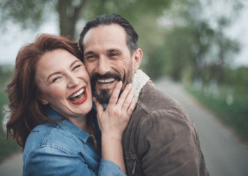 wife hugging husband