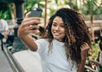 young girl taking selfie