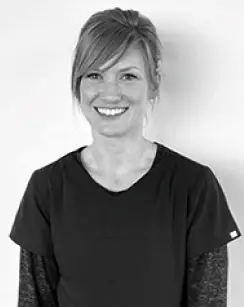Carolann, team lead at dental practice in Evergreen, Colorado, smiling for staff photo.