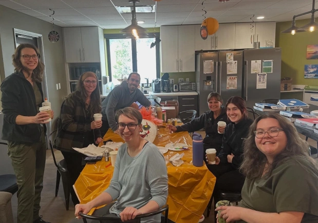 Team celebrating a community event