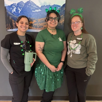 Team members dressed for a community costume event