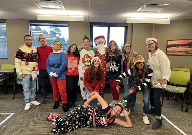Team giving back during a holiday community event