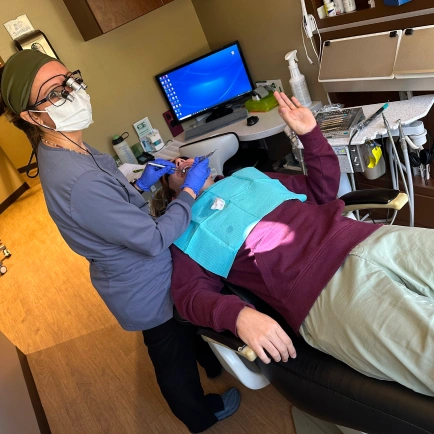Volunteers providing dental care during a community outreach event